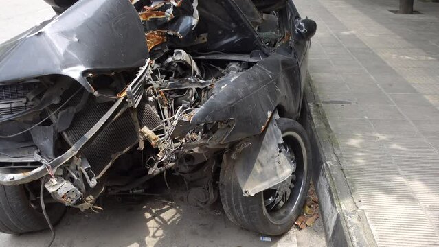 black car damaged by a road accident 