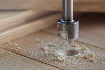Countersink drill bit make sink in hole for screw in old wooden plank