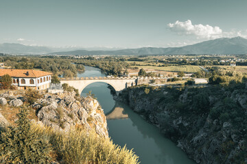 the ancient sacred bridge in Gjakova, Kosovo in the evening hours