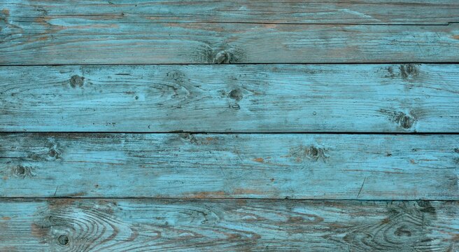Background of old vintage cracked rough blue wood horizontal planks in Provence style