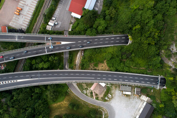 Highway entrance into tunnel aerial view