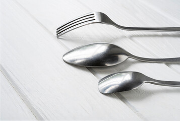 Cutlery. Spoon, filk, teaspoon on the table