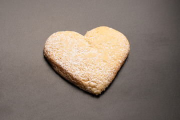 Shortbread in the shape of a heart isolated on white background.