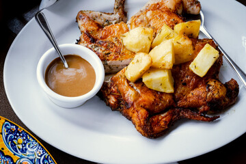 Baked chicken with potato and gravy dip