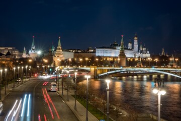 Obraz premium Moscow Kremlin, Kremlin Embankment and Moscow River at night in Moscow, Russia. Architecture and landmark of Moscow
