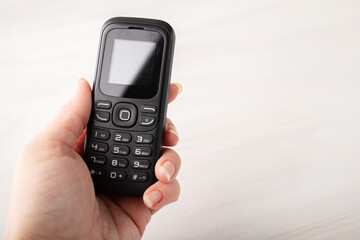 one-off phone, disposable cellphone, cheap disposable device with buttons