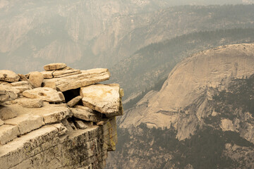 Empty Ledge Looks Over Yosemite Valley From Half Dome On Smoky Day