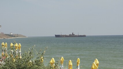 Rusted ship on the sea near the beach at Constanta Romania	