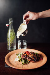 fried meat with sauce