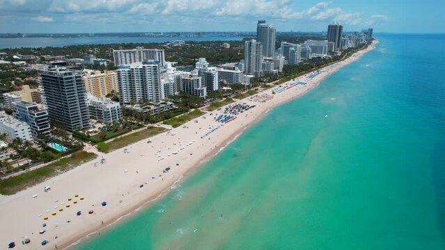 Miami Beach Florida. Panorama of Miami South Beach City FL. Atlantic Ocean. Summer vacations. Beautiful View on Residential house, Hotels and Resorts on Island. Turquoise color of salt water.