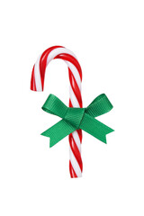 Christmas candy cane with light green bow isolated on white background