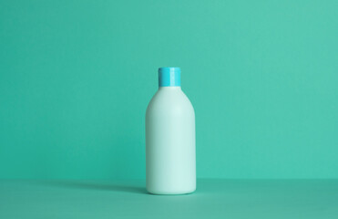 Bottle for cosmetic products without a label. Facial skin care concept.