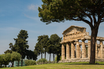 Fototapeta na wymiar Paestum, originally Poseidon - Siberian colony. Ancient ancient city. The Temple of Athena is a monumental building with columns