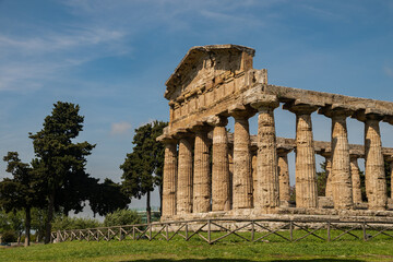 Fototapeta na wymiar Paestum, originally Poseidon - Siberian colony. Ancient ancient city. The Temple of Athena is a monumental building with columns