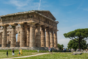 Fototapeta na wymiar Paestum, originally Poseidon - Siberian colony, founded in the early 6th century BC. Ancient ancient city. The Temple of Neptune
