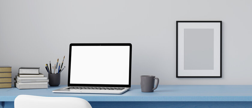 Blank computer laptop screen and various items on desktop workspace with picture frame in home office room. 3D renering illustration.