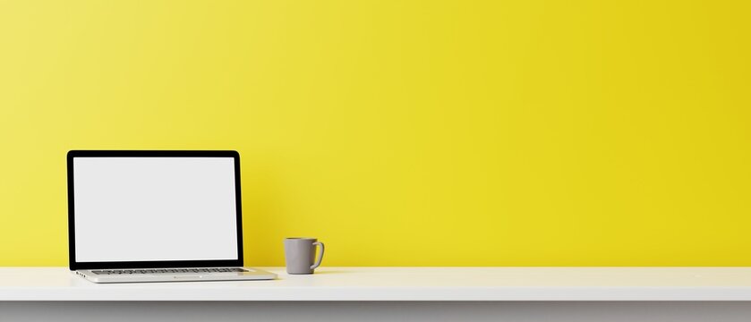Blank computer laptop screen and various items on desktop workspace in yellow wall home office room. 3D renering illustration.