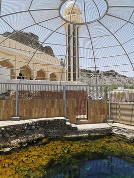 Ayn al-Kasfah in Rustaq, Oman, and it is one of the most famous hot springs in Oman
