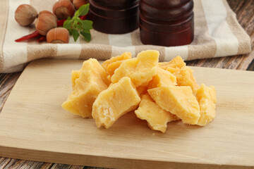 Crushed hard parmesan cheese pieces