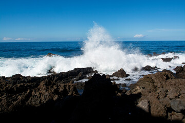 View on black lava rocks in small village Punta Brava near Puerto de la Cruz, Tenerife, Canary islands