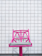 Background of modern pink metal bar chair on white tile wall in minimal style and vertical frame