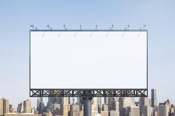 Obraz premium Blank white horizontal billboard on skyline background at daytime, front view. Mock up, advertising concept