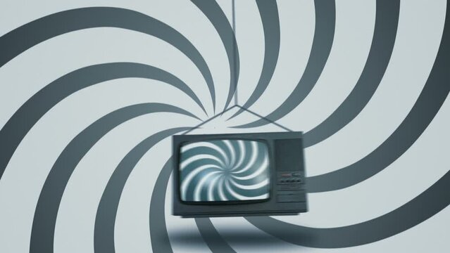 Hypnotic pendulum. Hypnotic spiral on TV screen. Concept of influence of media on people. Broadcast, false information, hoax, propaganda, brainwashing, information and disinformation concept.