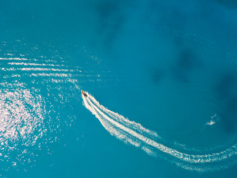 Aerial View Of Speed Boat In Blue Sea Water