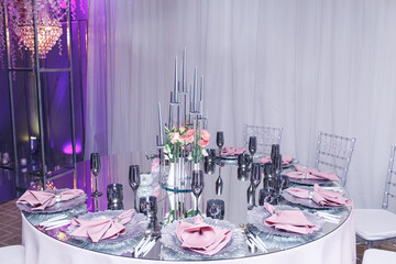 elegant decoration of the banquet table in the restaurant hall