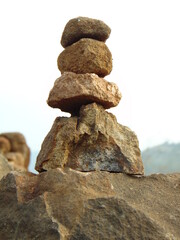 stack of stones, In our native place they used to stack the stones as a faith of god who'll fulfill their wishes.