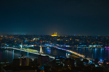 Fototapeta na wymiar Istanbul view from Galata Tower at night. Golden Horn and Istanbul