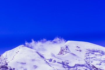  landscape of the peak of a mountain covered with snow.