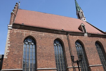 Saint Peter church in Riga Latvia built in 1209 year with two monk faces, these monks volunteered...