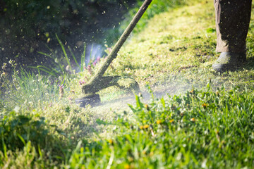 Lawn mover on green grass. Machine for cutting lawns.