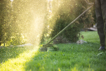 Lawn mover on green grass. Machine for cutting lawns.