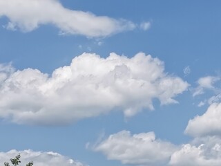 White cloud on blue sky. single cloud with sunny and blue sky background