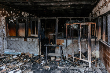 Burned interiors of hospital. Fire or war consequences concept