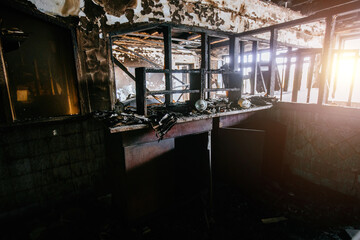 Burned interiors of hospital. Fire or war consequences concept