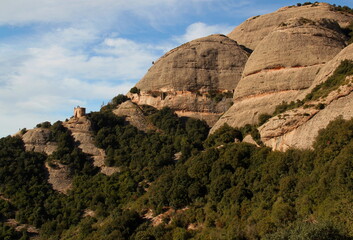 View of the mountains and the church Ermita de Sant Joan in the National park near the monastery of Montserrat near Barcelona, Catalonia, Spain