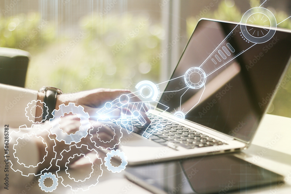 Aufkleber double exposure of robotics technology hologram and hands typing on laptop on background. research a