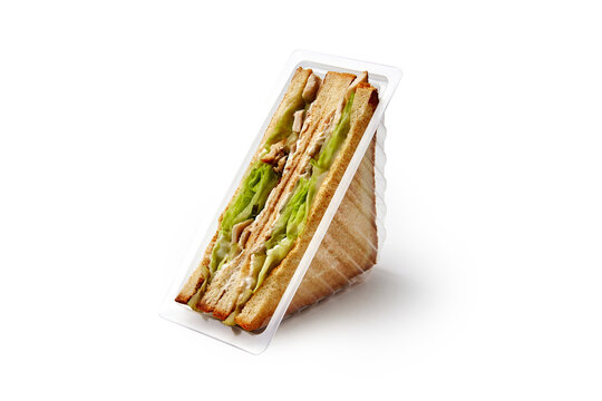 Sandwiches with chicken meat and lettuce in container