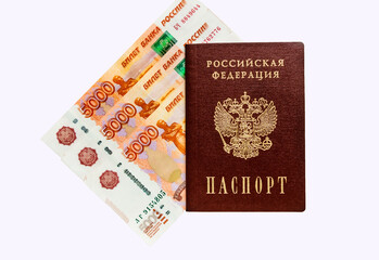 The Russian domestic lay on paper money (5000 rubles). White background, isolated. Top view.