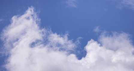 Obraz premium View of Cloudscape during a cloudy blue sky sunny day. Taken on the West Coast of British Columbia, Canada.