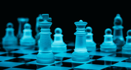 Glass chess, on the black background. Stock images. Close-up view