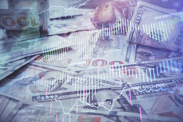 Multi exposure of forex chart drawing over us dollars bill background. Concept of financial success markets.