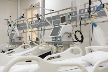Artificial lung ventilation apparatus in the intensive care unit of the hospital. Empty resuscitation room with modern medical equipment for artificial pulmonary respiration. COVID-19 and coronavirus.