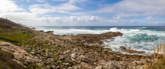 Galicia coast from Thalassa viewpoint in Pontevedra province with lighthouse, Spain