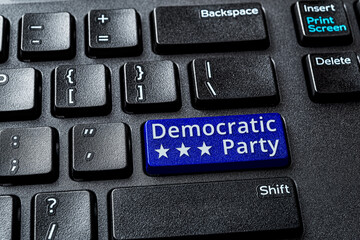 Democratic Party blue key on a decktop pc keyboard. United States elections and politics concepts....
