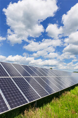 Solar Power Station in the sunny cloudy spring Nature