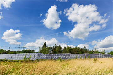 Solar Power Station in the sunny cloudy spring Nature